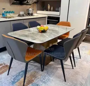 This Is a Modern Rectangular Marble-Top Dining Table