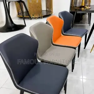 These Are Modern Upholstered Dining Chairs Featuring Sleek Contrast
