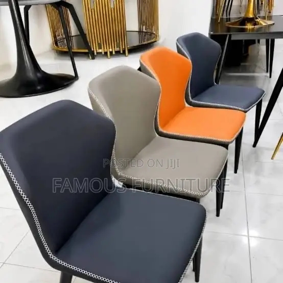 These Are Modern Upholstered Dining Chairs Featuring Sleek Contrast