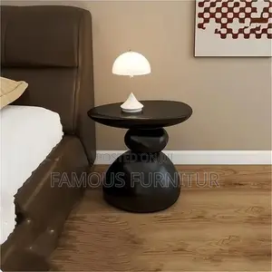 This Is a Modern Resin Pebble Side Stool Featuring a Unique Stacked