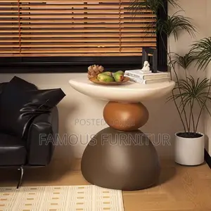 This Is a Modern Resin Pebble Side Stool Featuring a Unique Stacked
