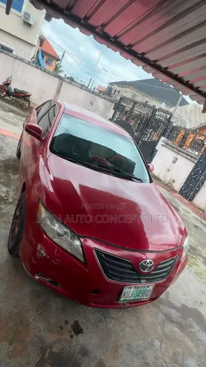 Toyota Camry Base 4dr Sedan (2.5L 4cyl 6M) 2010 Red