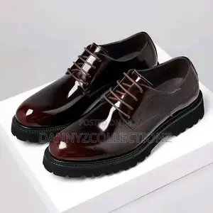 Brown Gucci Shoe