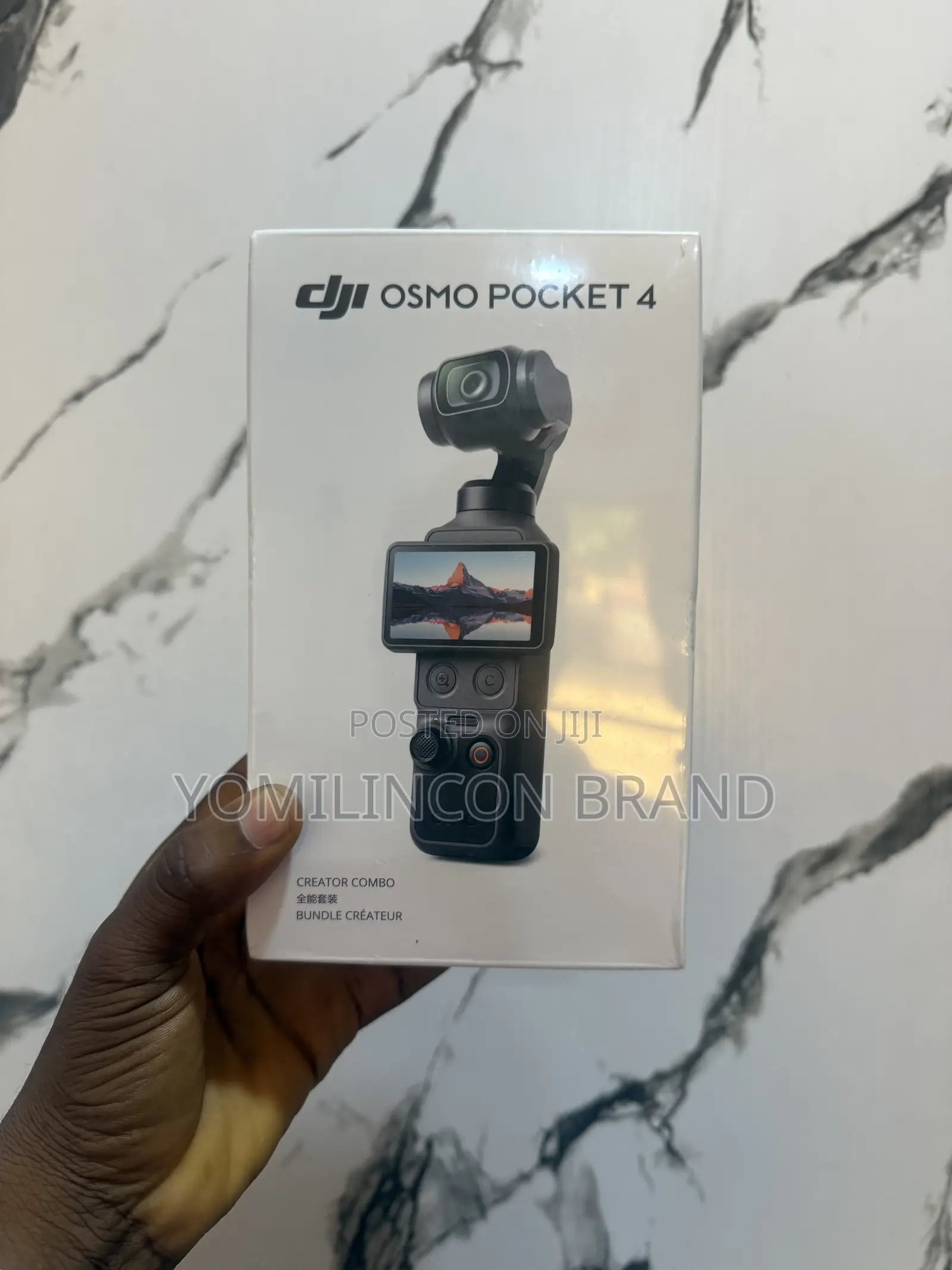 Dji Osmo Pocket 4 Handheld Camera (Creator Combo)