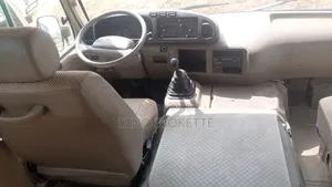 Toyota Coaster 2018 Gold