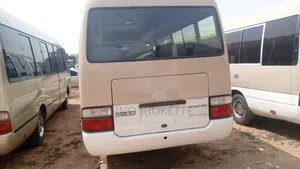 Toyota Coaster 2018 Gold
