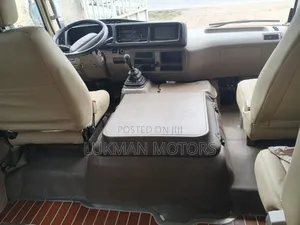 Toyota Coaster 2022 Brown