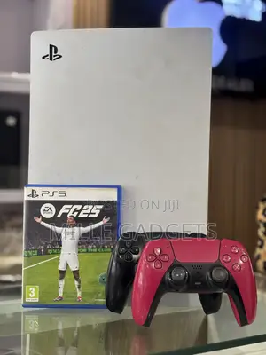 PS5 With Two Controllers and FC25