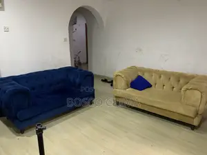 A Pair of Neatly Used 2 Seater Sofas