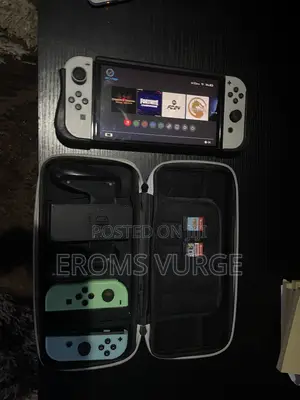 Nintendo Switch Oled +(2 Pairs of Joy Cons, 3 Game Cards)
