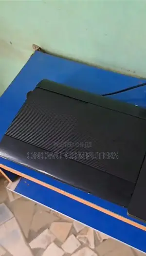 Ps3 Super Slim Hacked With 2 Pads and 56 Games Installed