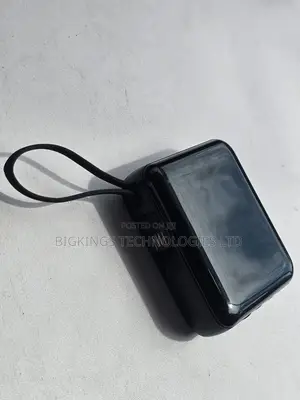 Used Portable Power Bank With Built-in Multi-Device Charging Cables
