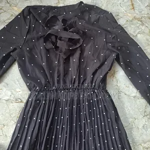 A Black Poka Dot Dress