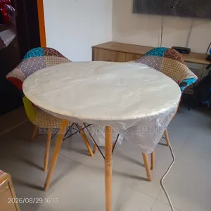 Round Dining Table + 2 Patchwork Accent Chairs
