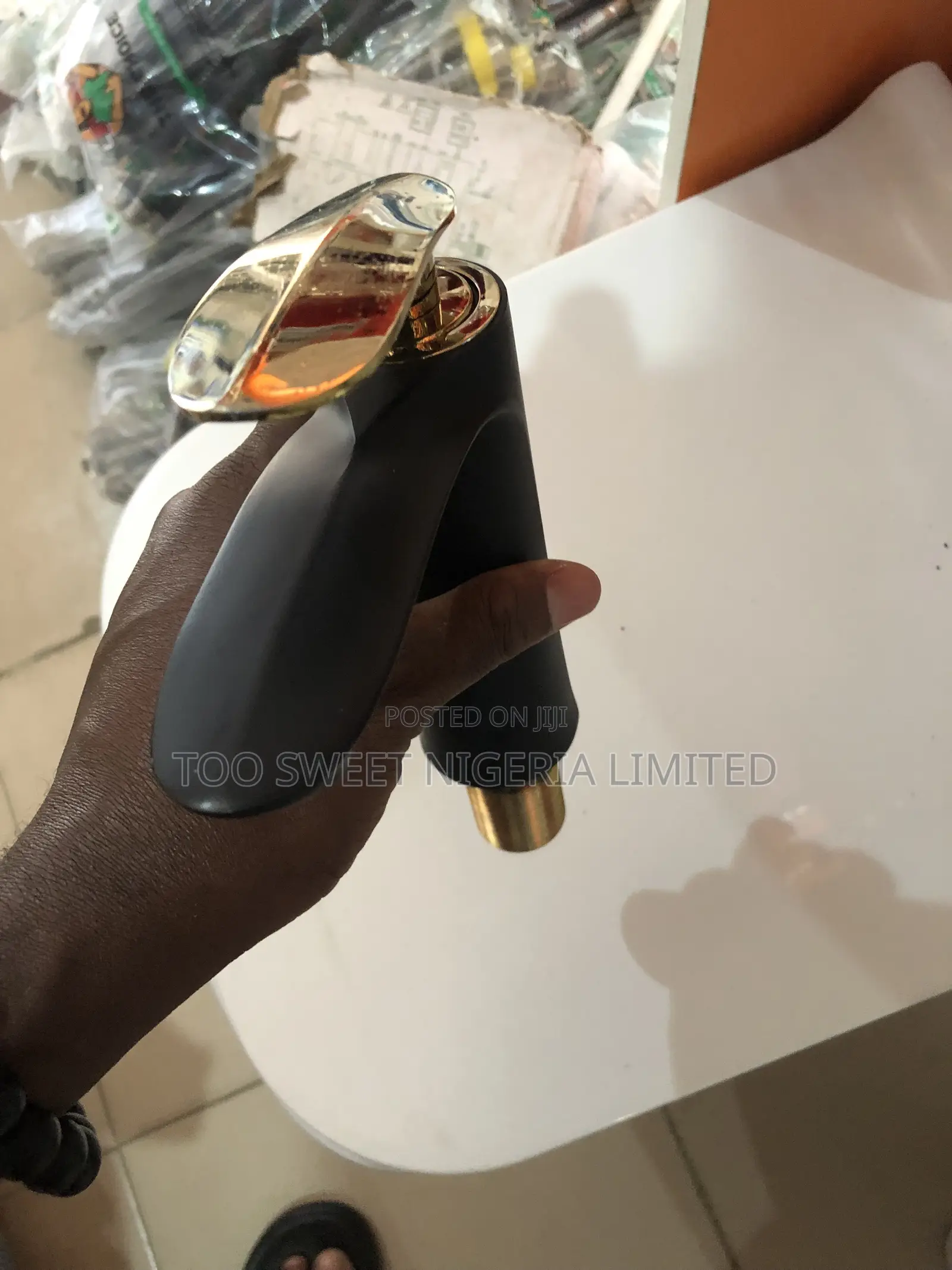 Sharp Basin Tap in Gold and Black