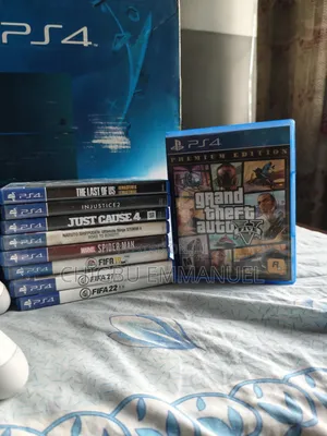 Sony PS4 Fat 500GB + 3 Controllers + 9 Original Games
