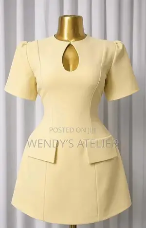 An Elegant Structured Keyhole Puff-Sleeve Mini Dress