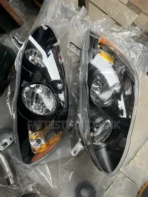 Headlamp Corolla 03-05 Dark