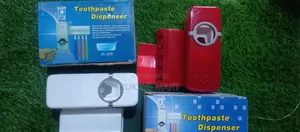 Toothpaste Dispenser With Brush Holder