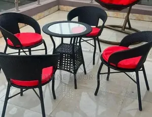 Poolside Rattan Chairs and Glass Table