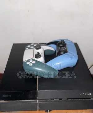 Used PS4 With 2 Pads, FC 25,PES 25 and Mortal Combat All Present