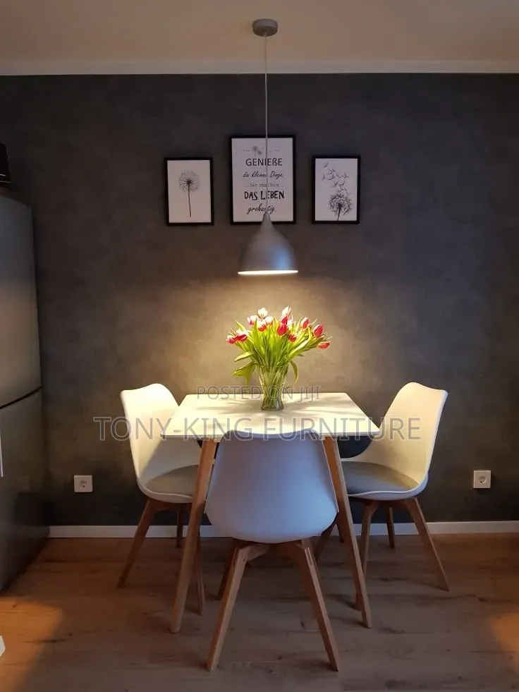Modern White Rectangular Dining Table Set Featuring Four White Chairs