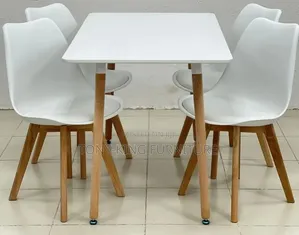 Modern White Rectangular Dining Table Set Featuring Four White Chairs