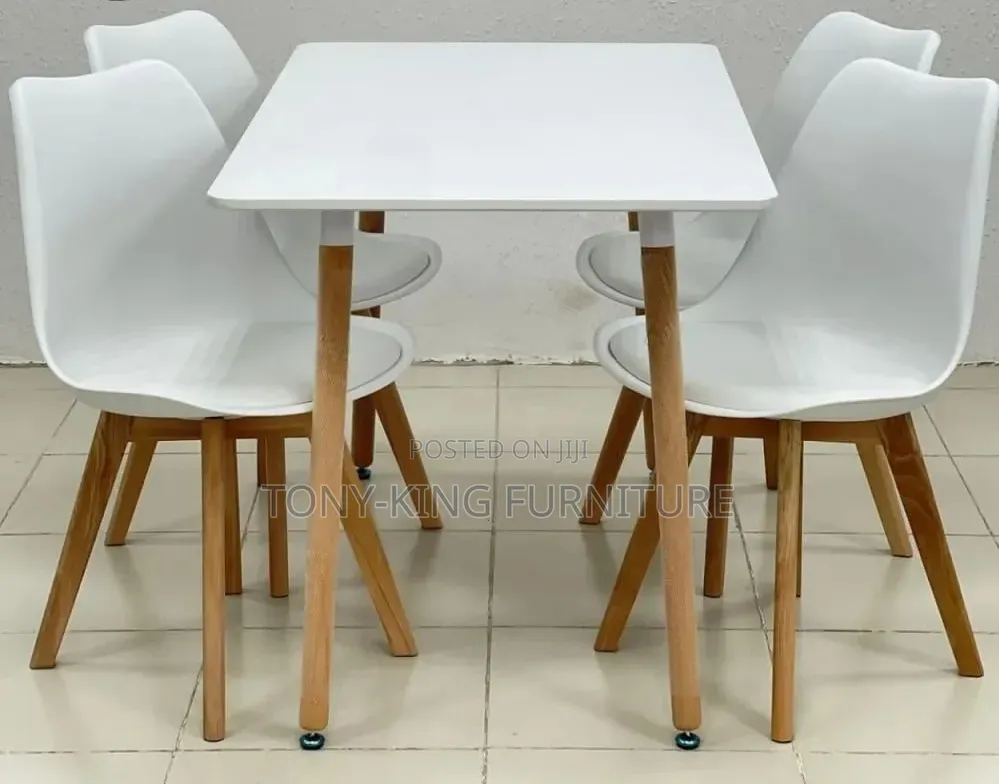 Modern White Rectangular Dining Table Set Featuring Four White Chairs