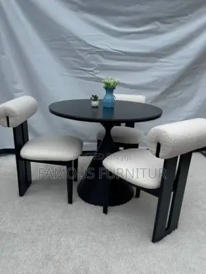 This Image Shows a Modern 3-Seater Minimalist Round Dining Set