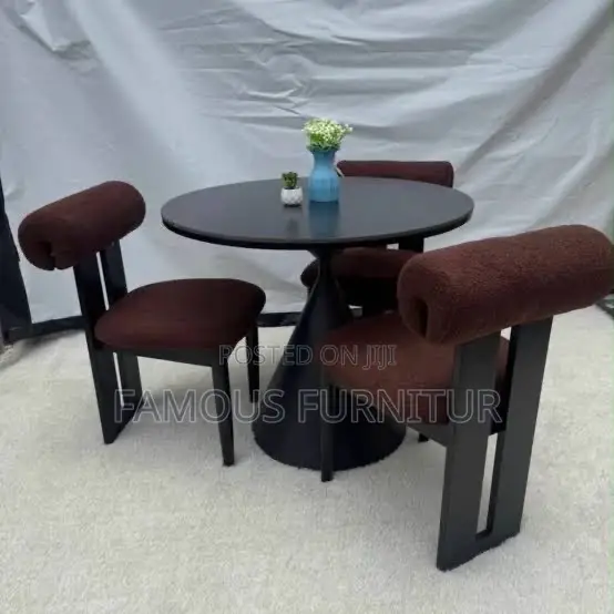 This Image Shows a Modern 3-Seater Minimalist Round Dining Set