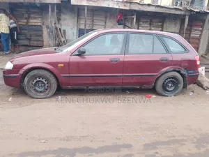 Mazda 323 1.6 2003 Burgundy