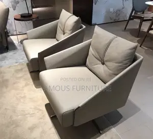 Modern Leather Swivel Accent Chair in a Beige Finish With Distinctive
