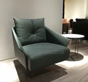Modern Leather Swivel Accent Chair in a Beige Finish With Distinctive