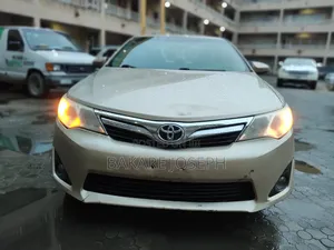 Toyota Camry LE 4dr Sedan (2.5L 4cyl 6A) 2012 Gold