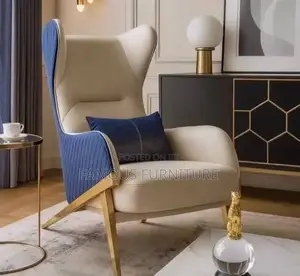 Modern High-Back Wingback Accent Chair Featuring a Vibrant Orange