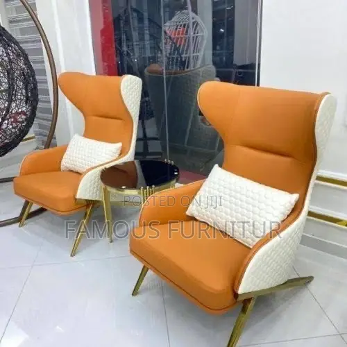 Modern High-Back Wingback Accent Chair Featuring a Vibrant Orange
