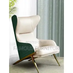 Modern High-Back Wingback Accent Chair Featuring a Vibrant Orange