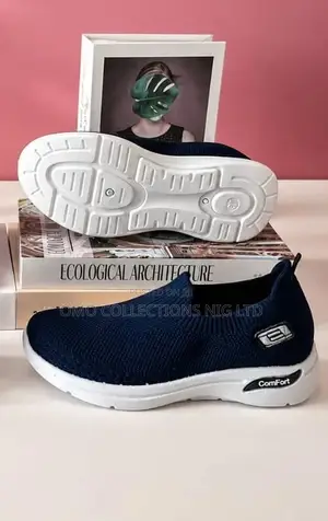 Fully Boxed Women’s Comfortable Slip-on Knit Sneakers