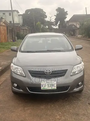 Toyota Corolla Base 4dr Sedan (1.8L 4cyl 5M) 2009 Gray