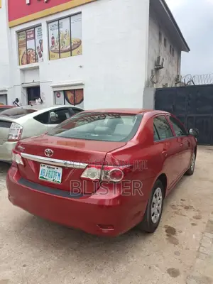 Toyota Corolla L 4dr Sedan (1.8L 4cyl 5M) 2013 Red