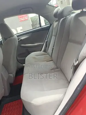 Toyota Corolla L 4dr Sedan (1.8L 4cyl 5M) 2013 Red