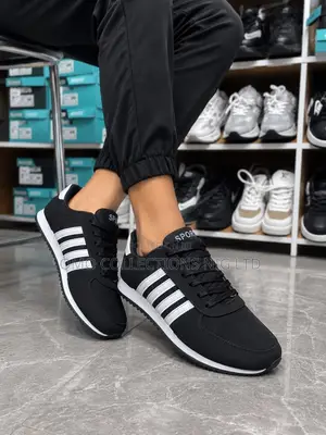 Classic Adidas Men’s Black and White Sneakers– Stylish and Comfortable