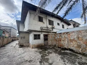Land Measuring 700sqm With a Demolishable Building on It,