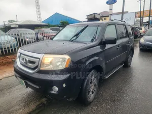 Honda Pilot EX-L 4dr SUV 4WD (3.5L 6cyl 5A) 2010 Black