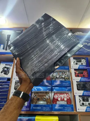 Playstation 3 Slim UK Used Hacked With 10 Games and 2 Customized Pad