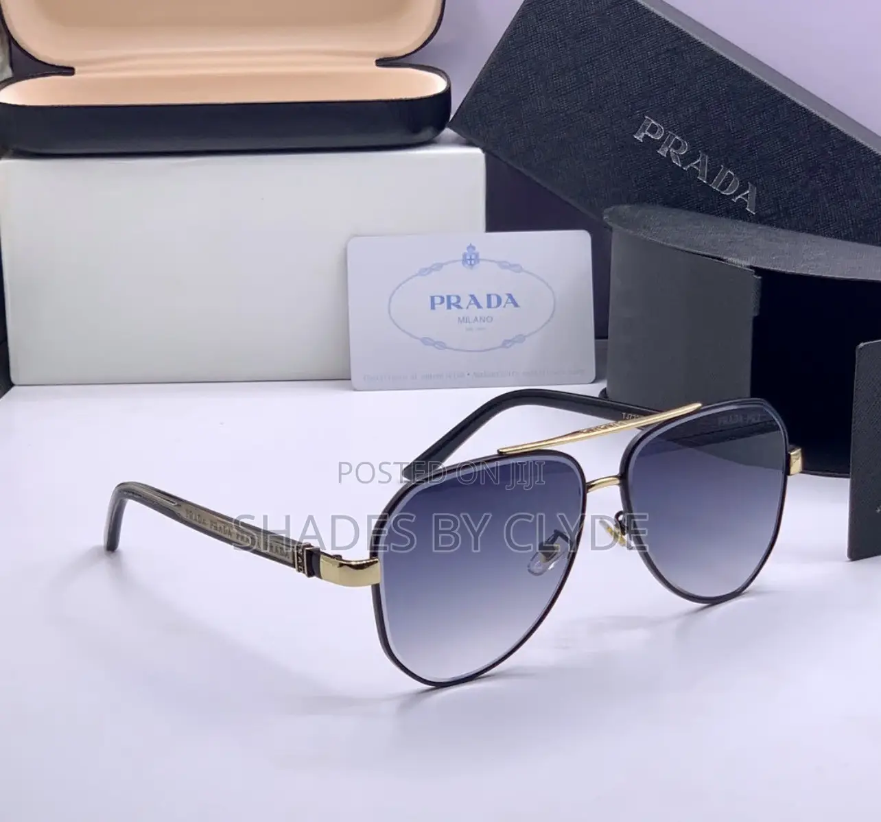 Prada Milano Sunglasses – Gold Black Edition