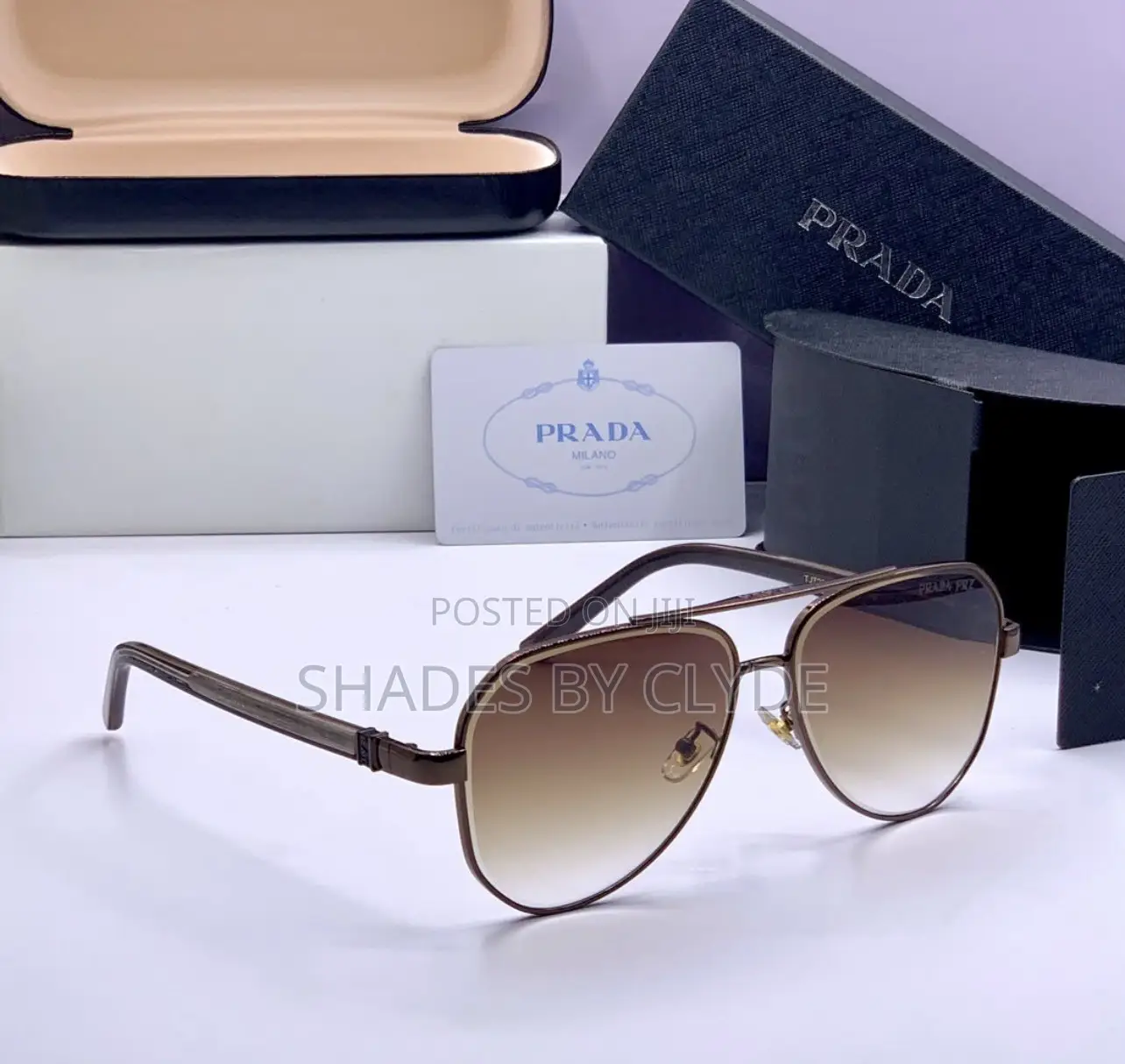 Prada Milano Sunglasses – Gold Black Edition
