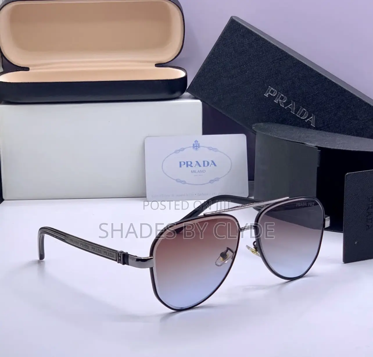 Prada Milano Sunglasses – Gold Black Edition