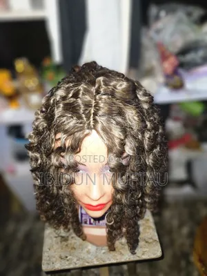 Synthetic Curls Wig.