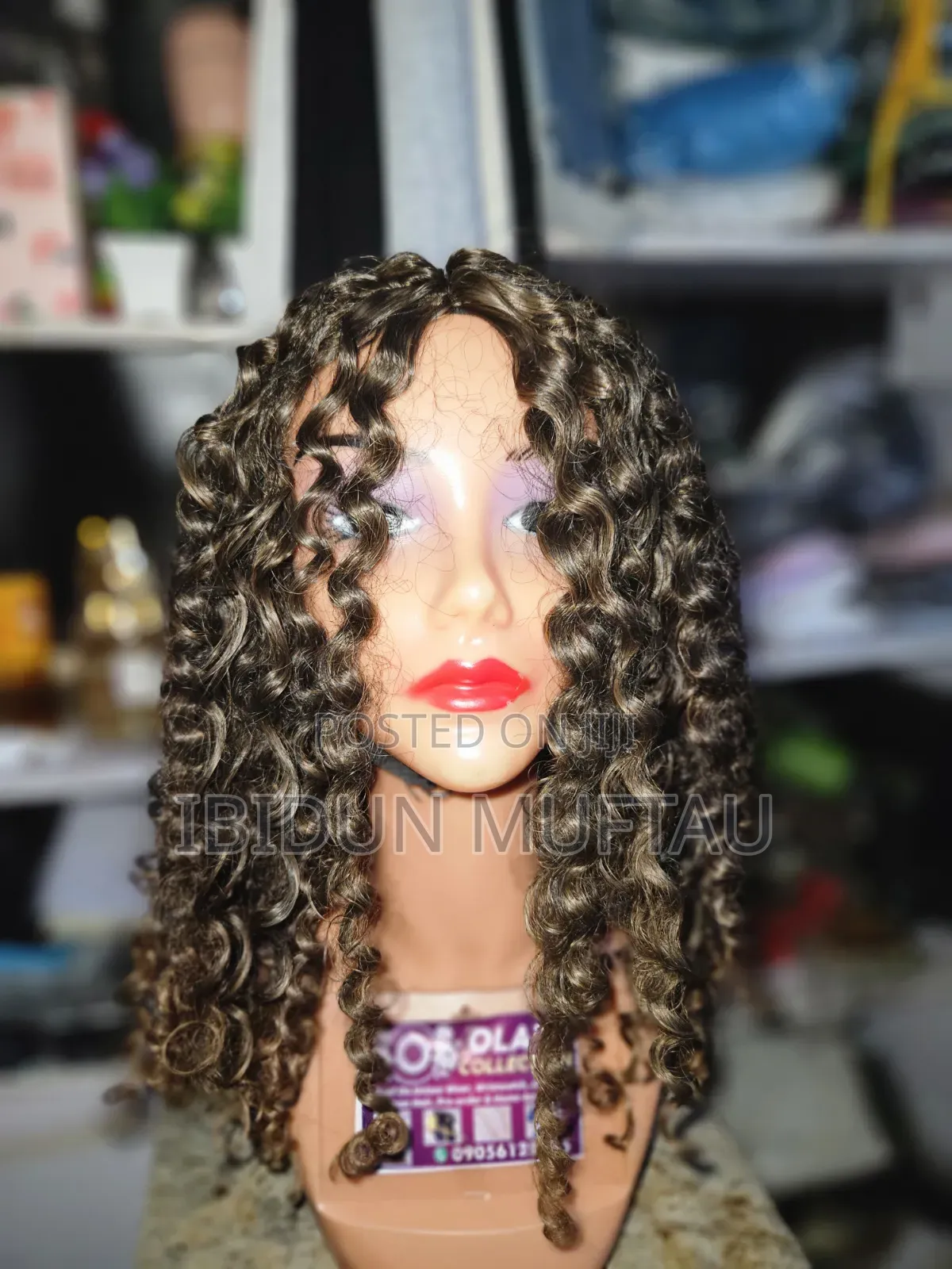 Synthetic Curls Wig.